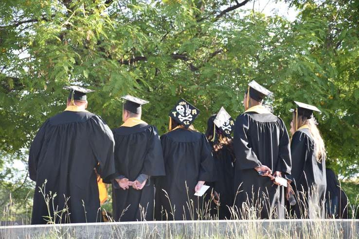 People enjoying commencement activities