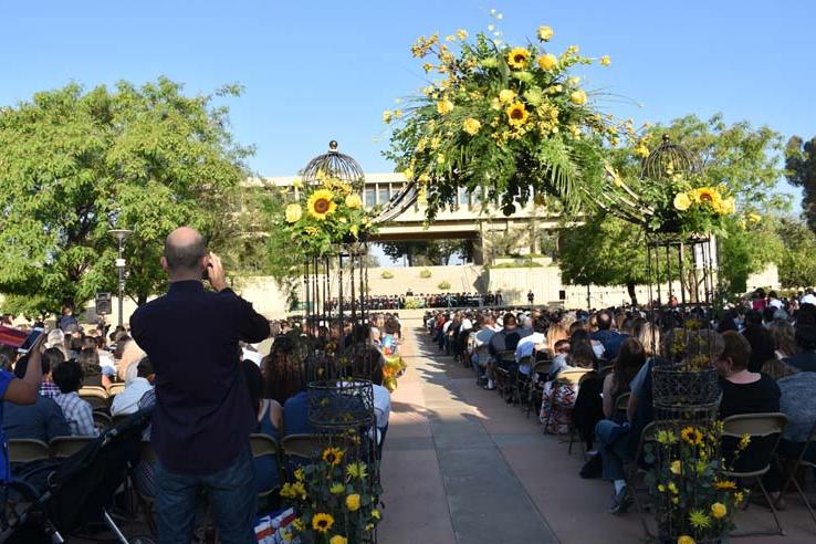 People enjoying commencement activities