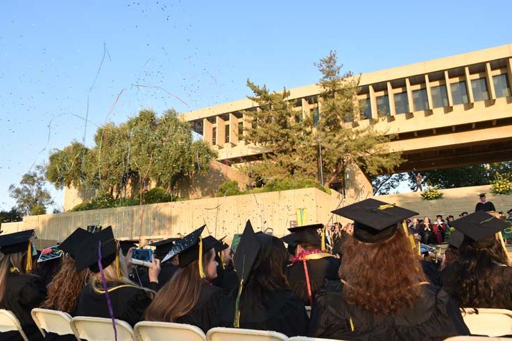 People enjoying commencement activities