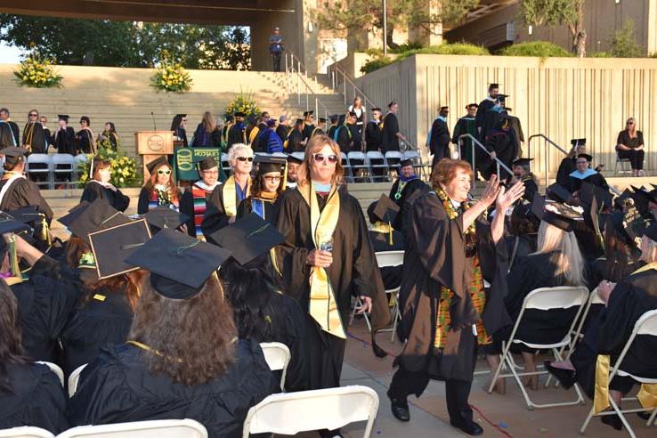 People enjoying commencement activities