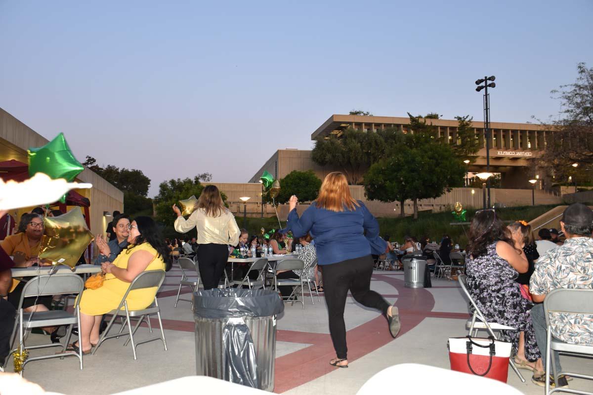 People enjoying the EOP&S Awards Ceremony