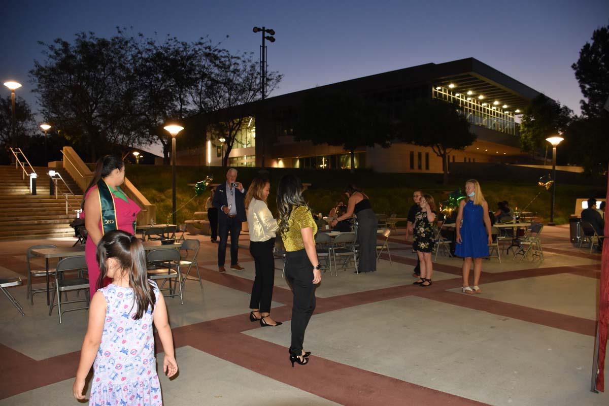 People enjoying the EOP&S Awards Ceremony